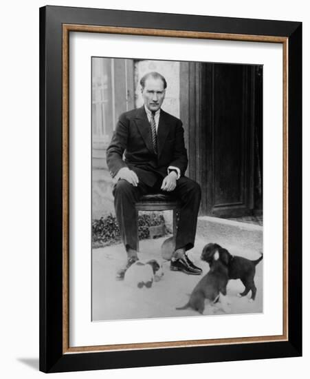 Mustafa Kemal Ataturk, President of Turkey, with His Pet Dogs, Ca. 1930-null-Framed Photo