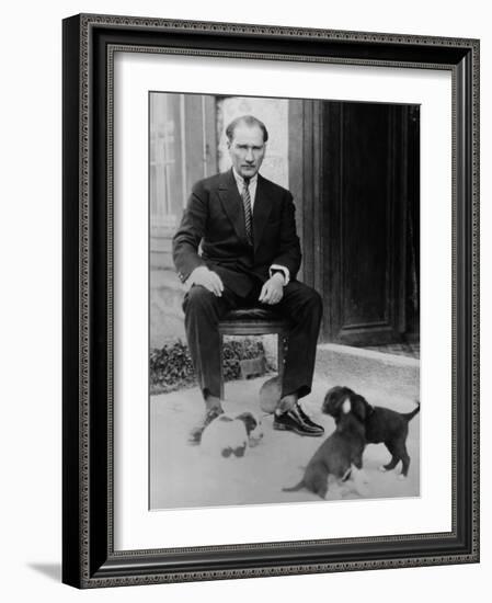 Mustafa Kemal Ataturk, President of Turkey, with His Pet Dogs, Ca. 1930-null-Framed Photo