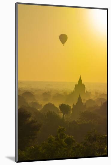 Myanmar. Bagan. Hot Air Balloons Rising over the Temples of Bagan-Inger Hogstrom-Mounted Photographic Print