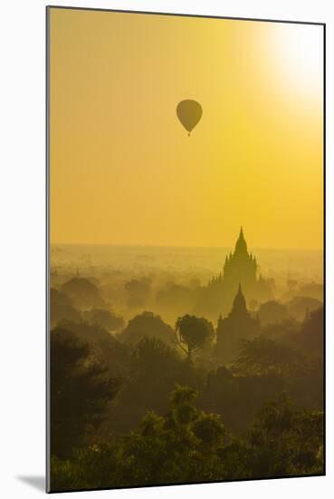 Myanmar. Bagan. Hot Air Balloons Rising over the Temples of Bagan-Inger Hogstrom-Mounted Photographic Print