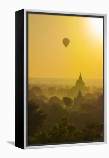 Myanmar. Bagan. Hot Air Balloons Rising over the Temples of Bagan-Inger Hogstrom-Framed Premier Image Canvas