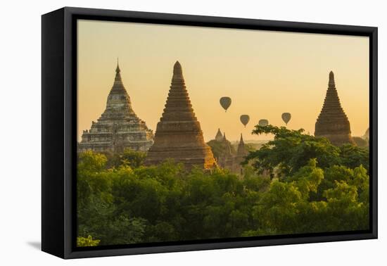 Myanmar. Bagan. Hot Air Balloons Rising over the Temples of Bagan-Inger Hogstrom-Framed Premier Image Canvas