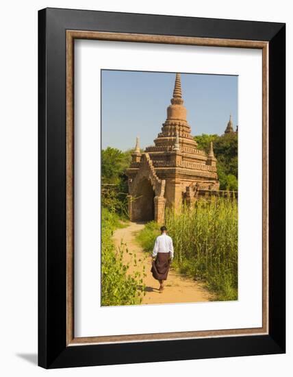 Myanmar. Bagan. Htilominlo Temple. Man Walking Towards the Temple Gate-Inger Hogstrom-Framed Photographic Print