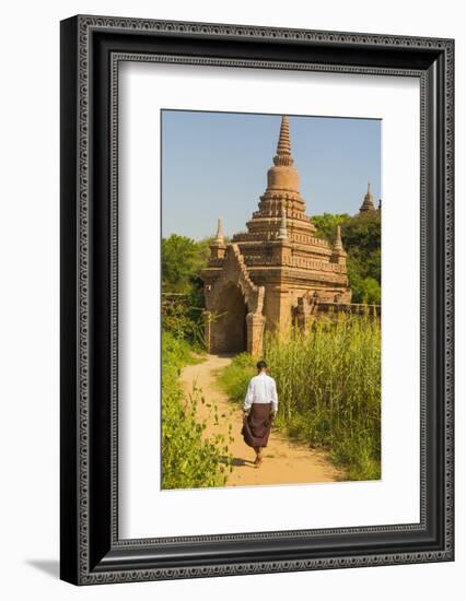 Myanmar. Bagan. Htilominlo Temple. Man Walking Towards the Temple Gate-Inger Hogstrom-Framed Photographic Print