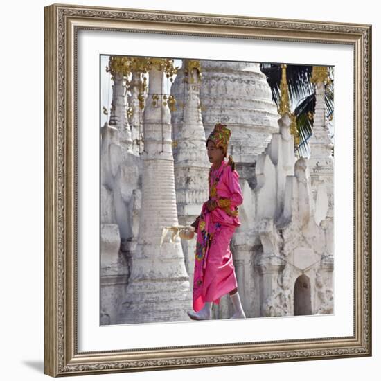 Myanmar, Burma, Lake Inle, A Young Novitiate Passes an Ornate Buddhist Shrine-Nigel Pavitt-Framed Photographic Print