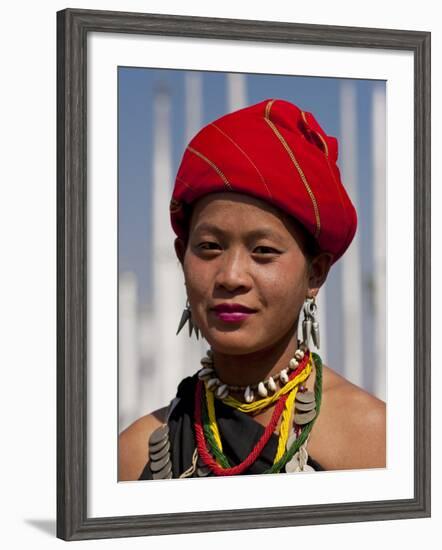 Myanmar, Burma, Loikaw; a Kayah Girl in Front of Ceremonial Posts at Chitkel Village-Katie Garrod-Framed Photographic Print