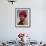 Myanmar, Burma, Loikaw; a Kayah Girl in Front of Ceremonial Posts at Chitkel Village-Katie Garrod-Framed Photographic Print displayed on a wall