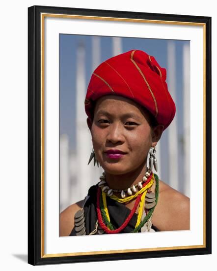 Myanmar, Burma, Loikaw; a Kayah Girl in Front of Ceremonial Posts at Chitkel Village-Katie Garrod-Framed Photographic Print