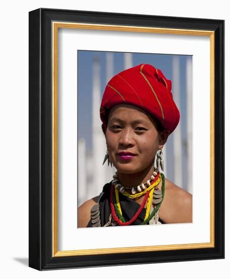 Myanmar, Burma, Loikaw; a Kayah Girl in Front of Ceremonial Posts at Chitkel Village-Katie Garrod-Framed Photographic Print