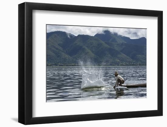 Myanmar, Inle Lake. Man Slaps His Paddle on the Surface of the Lake to Stun the Fish-Brenda Tharp-Framed Photographic Print