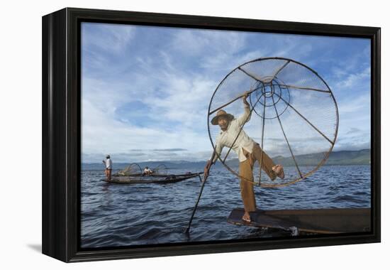 Myanmar, Inle Lake. Young Fisherman Demonstrates a Traditional Rowing Technique-Brenda Tharp-Framed Premier Image Canvas