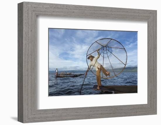 Myanmar, Inle Lake. Young Fisherman Demonstrates a Traditional Rowing Technique-Brenda Tharp-Framed Photographic Print