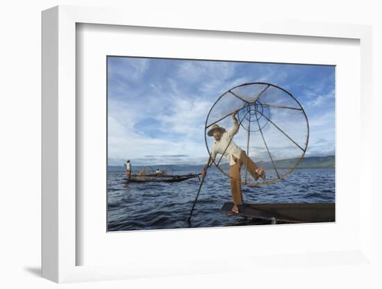 Myanmar, Inle Lake. Young Fisherman Demonstrates a Traditional Rowing Technique-Brenda Tharp-Framed Photographic Print