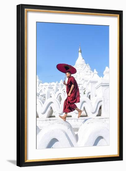 Myanmar, Mandalay Division, Mingun. Novice Monk with Red Umbrella Jumping on Hsinbyume Pagoda (Mr)-Matteo Colombo-Framed Photographic Print