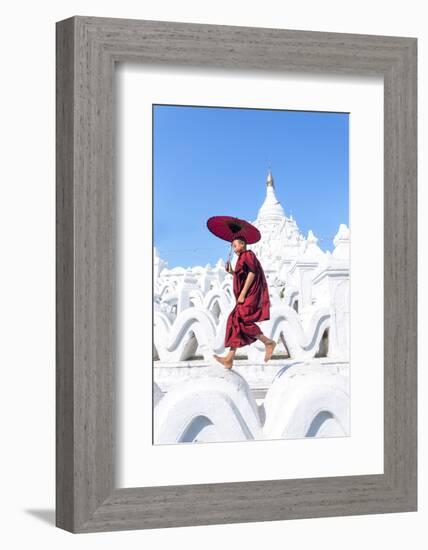 Myanmar, Mandalay Division, Mingun. Novice Monk with Red Umbrella Jumping on Hsinbyume Pagoda (Mr)-Matteo Colombo-Framed Photographic Print