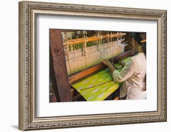 Myanmar. Shan State. Inle Lake. Woman weaving silk at a wooden loom.-Inger Hogstrom-Framed Photographic Print