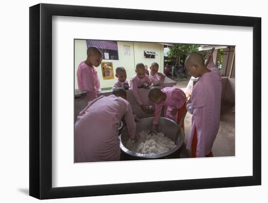 Myanmar, Yangon. Nuns Serving Rice from a Huge Rice Pot at a Female Monastery-Brenda Tharp-Framed Photographic Print