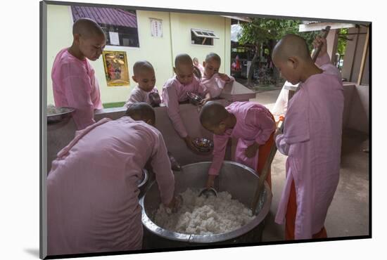 Myanmar, Yangon. Nuns Serving Rice from a Huge Rice Pot at a Female Monastery-Brenda Tharp-Mounted Photographic Print