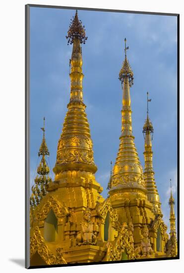 Myanmar. Yangon. Shwedagon Pagoda. Golden Spires Gleam at Twilight-Inger Hogstrom-Mounted Photographic Print