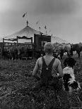 Young Boy and His Dog Watching the Circus Tents Being Set Up-Myron Davis-Photographic Print