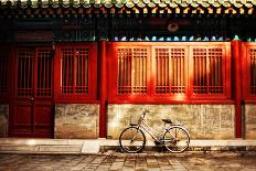 One Bicycle in Front of Oriental Red Building in Urban Asia City on Street Sidewalk on Sunny Aftern-N K-Photographic Print