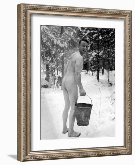 Naked Finnish Soldier Carrying Bucket of Water Back to Friends Enjoying Sauna Bath Nearby-Carl Mydans-Framed Photographic Print