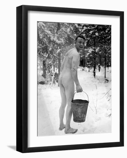 Naked Finnish Soldier Carrying Bucket of Water Back to Friends Enjoying Sauna Bath Nearby-Carl Mydans-Framed Photographic Print