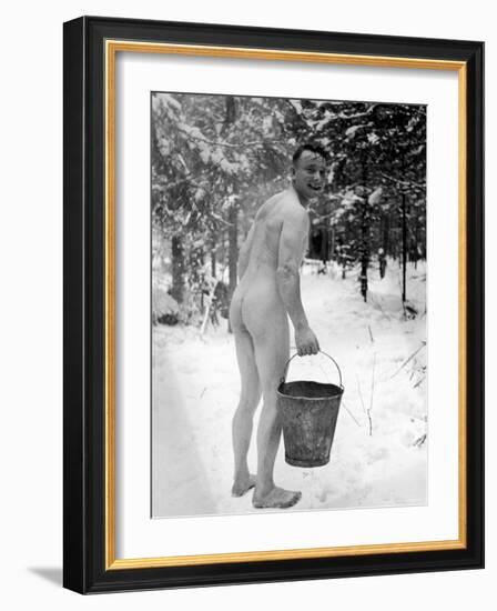 Naked Finnish Soldier Carrying Bucket of Water Back to Friends Enjoying Sauna Bath Nearby-Carl Mydans-Framed Photographic Print