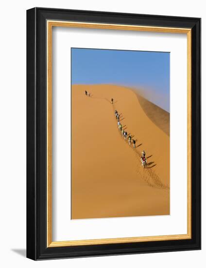 Namibia, Namib-Naukluft National Park, Sossusvlei. Tourists climbing Dune 45.-Ellen Goff-Framed Photographic Print