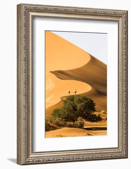 Namibia, Namib-Naukluft National Park, Sossusvlei. Two tourists climbing the scenic dune.-Ellen Goff-Framed Photographic Print