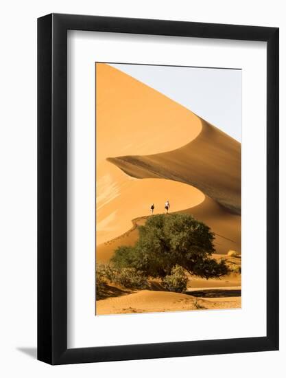 Namibia, Namib-Naukluft National Park, Sossusvlei. Two tourists climbing the scenic dune.-Ellen Goff-Framed Photographic Print