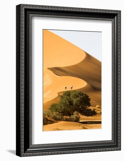 Namibia, Namib-Naukluft National Park, Sossusvlei. Two tourists climbing the scenic dune.-Ellen Goff-Framed Photographic Print