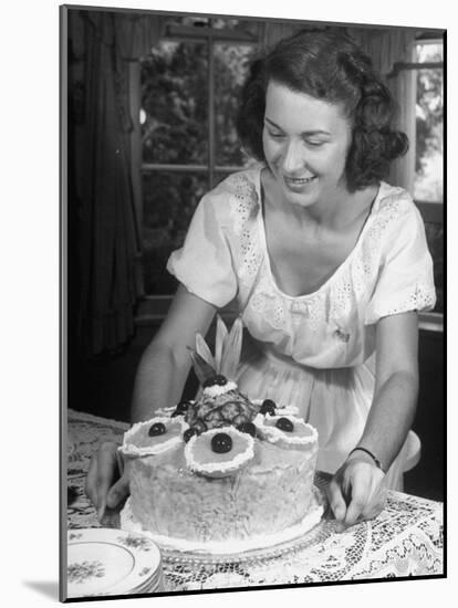 Nancy Drooling over a Pineapple Cake-Nina Leen-Mounted Photographic Print