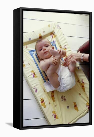 Nappy Change-Ian Boddy-Framed Premier Image Canvas