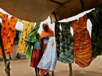 A Sudanese Woman Buys a Dress for Her Daughter at the Zamzam Refugee Camp-Nasser Nasser-Photographic Print
