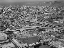 Cars Driving Through City-Nat Farbman-Photographic Print