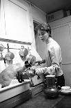 Bettina Graziani Prepares Coffee in Her Kitchen with One of Her Siamese Cats, Paris, France, 1952-Nat Farbman-Photographic Print