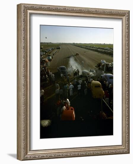 National Hot Rod Association's National Opening Drag Race Held at the Orange County Airport-Ralph Crane-Framed Photographic Print