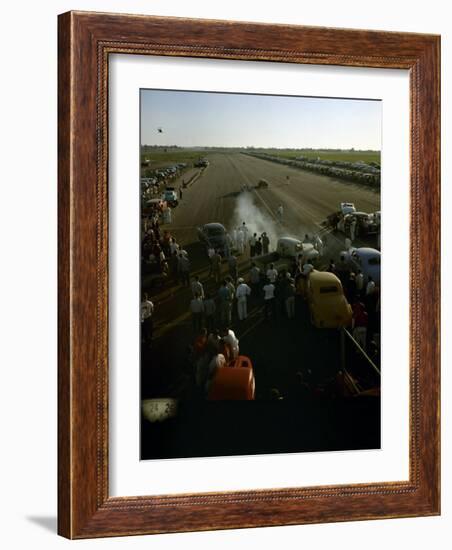 National Hot Rod Association's National Opening Drag Race Held at the Orange County Airport-Ralph Crane-Framed Photographic Print