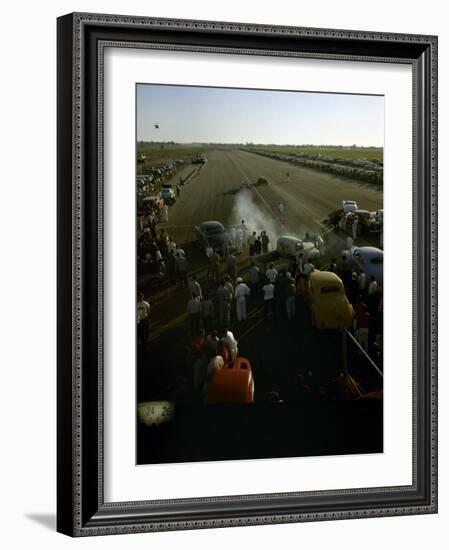 National Hot Rod Association's National Opening Drag Race Held at the Orange County Airport-Ralph Crane-Framed Photographic Print