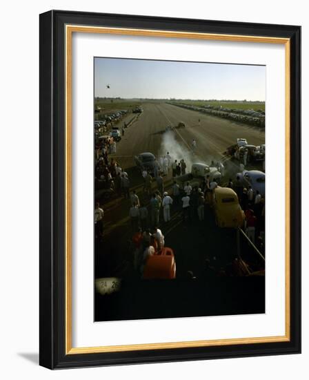 National Hot Rod Association's National Opening Drag Race Held at the Orange County Airport-Ralph Crane-Framed Photographic Print