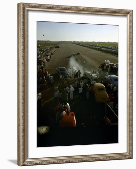 National Hot Rod Association's National Opening Drag Race Held at the Orange County Airport-Ralph Crane-Framed Photographic Print