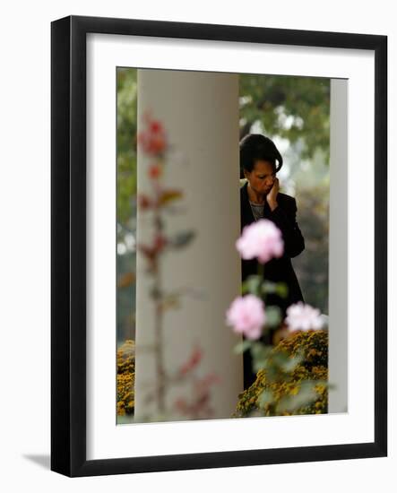 National Security Adviser Condoleezza Rice Listens to President Bush Speak About Cuba-null-Framed Photographic Print
