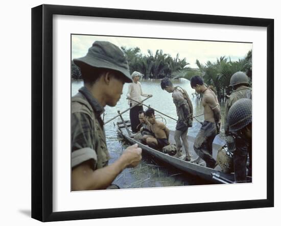 Nationalist S Vietnamese Soldiers Loading Viet Cong Prisoners Onto Canoe Like Boats in Mekong Delta-Larry Burrows-Framed Photographic Print