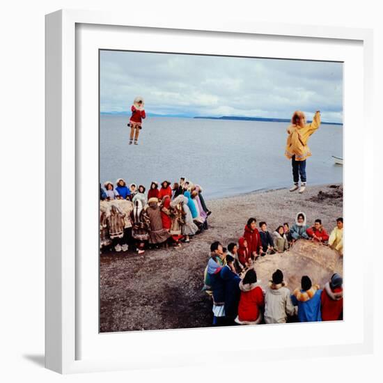 Native Alaskans Playing a Game of Nulukatuk, in Which Individals are Tossed into the Air-Ralph Crane-Framed Photographic Print