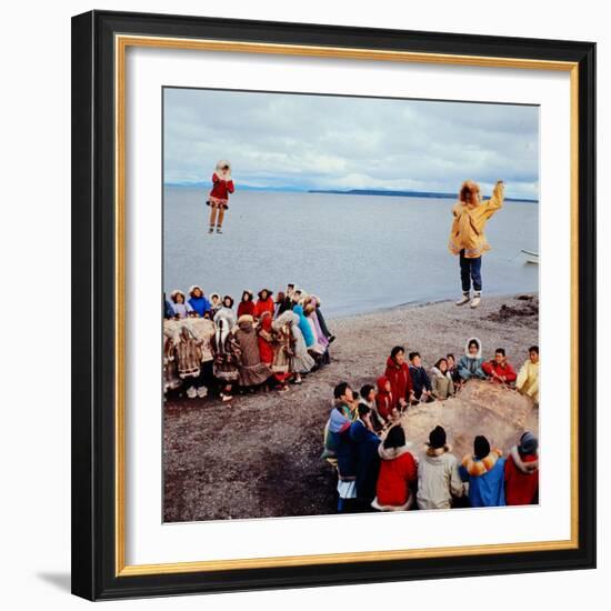 Native Alaskans Playing a Game of Nulukatuk, in Which Individals are Tossed into the Air-Ralph Crane-Framed Photographic Print