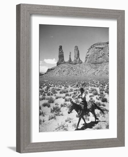 Native American Indian Boy Running His Horse Through Desert-Loomis Dean-Framed Photographic Print