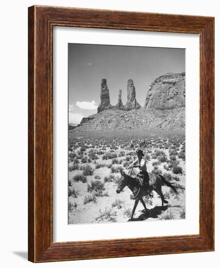 Native American Indian Boy Running His Horse Through Desert-Loomis Dean-Framed Photographic Print