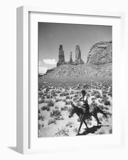 Native American Indian Boy Running His Horse Through Desert-Loomis Dean-Framed Photographic Print