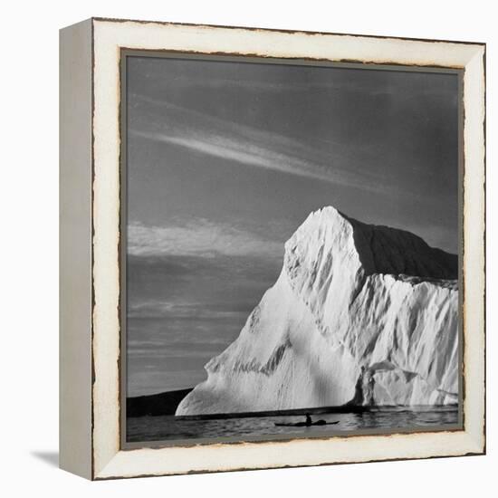 Native Man in Kayak Sitting in Water Next to Iceberg-null-Framed Premier Image Canvas